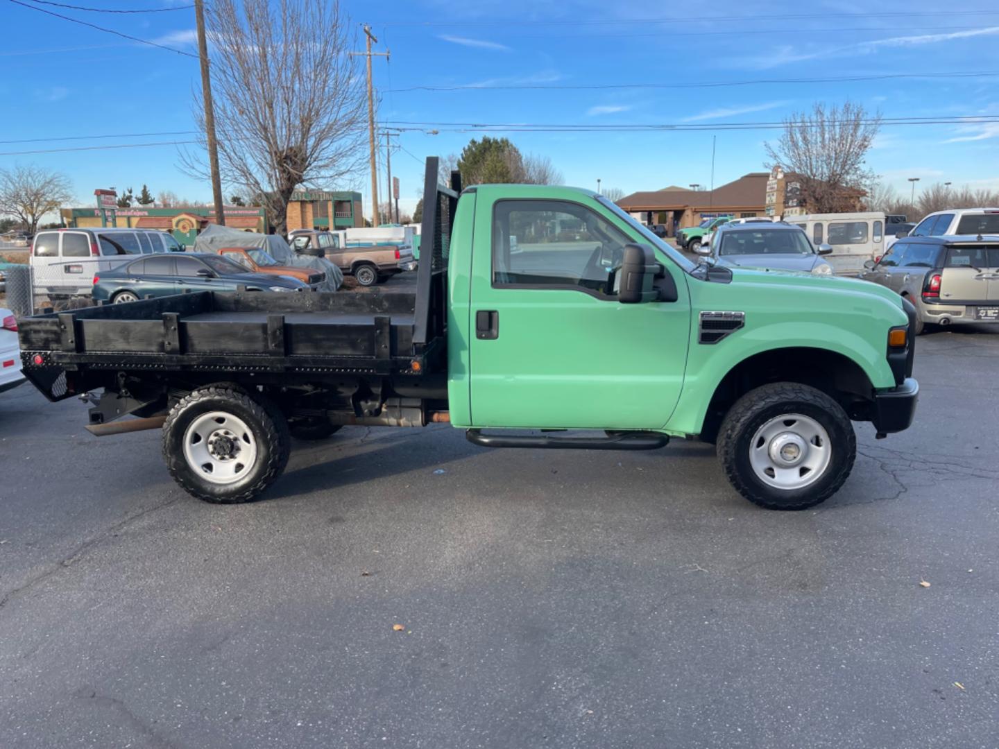 2008 Forest Service Green /Grey Ford F-350 SD XL 4WD (1FTWF31Y68E) with an 6.8L V10 SOHC 30V engine, 6-Speed Manual transmission, located at 813 E Fairview Ave, Meridian , ID, 83642, (208) 336-8230, 43.618851, -116.384010 - Photo#4